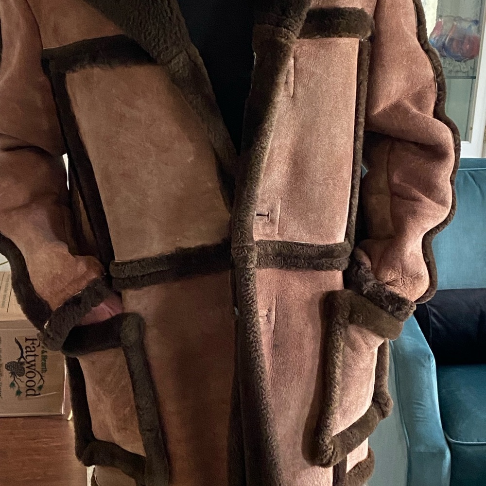Never worn outside. WARM SIZE suede sheepskin jacket. Will keep you cozy!
